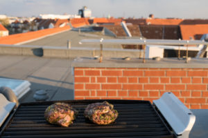 Berlin, attic, terrace, grill with lamb Berlin, attic, terrace, grill with lamb